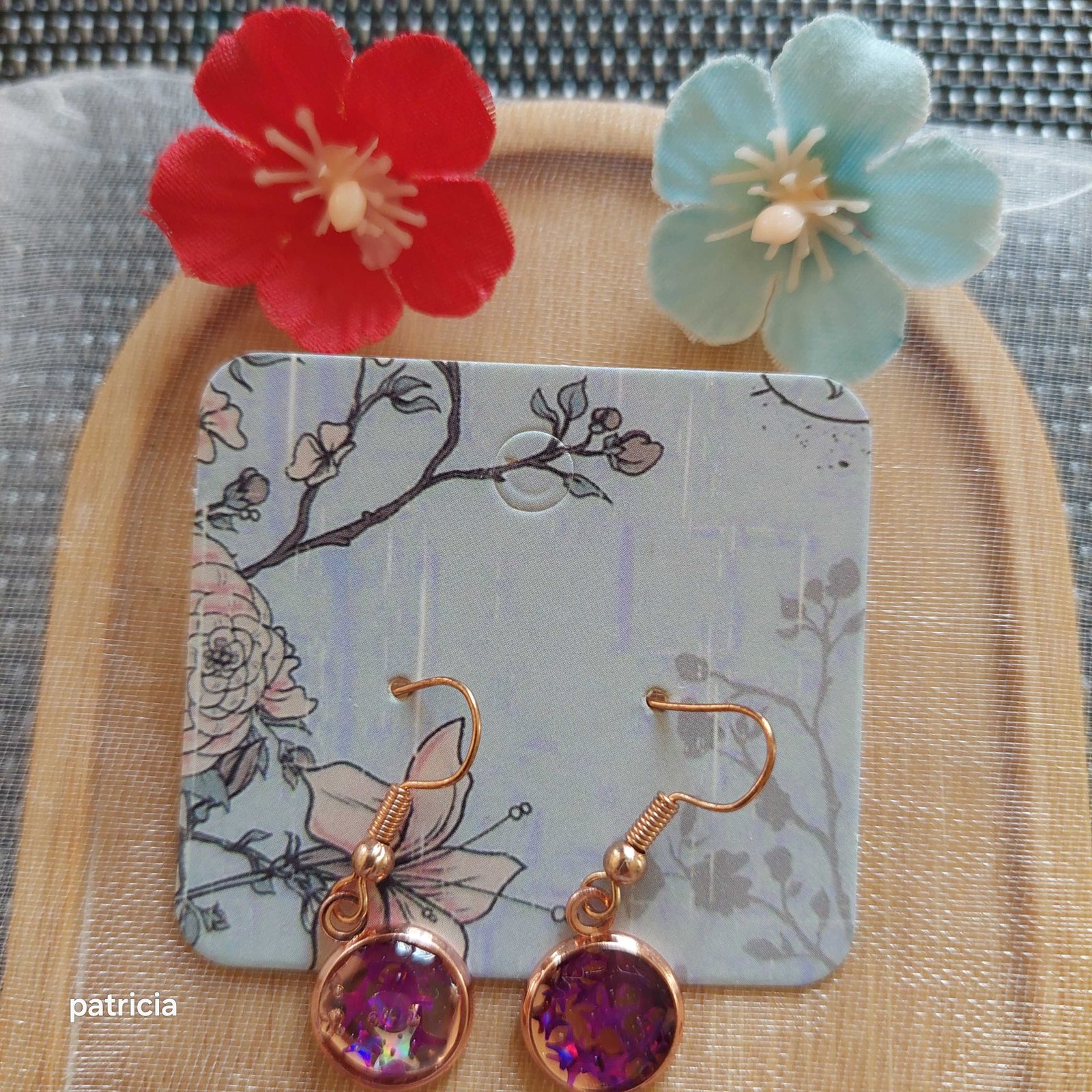 Boucles d'oreilles éclat prune.